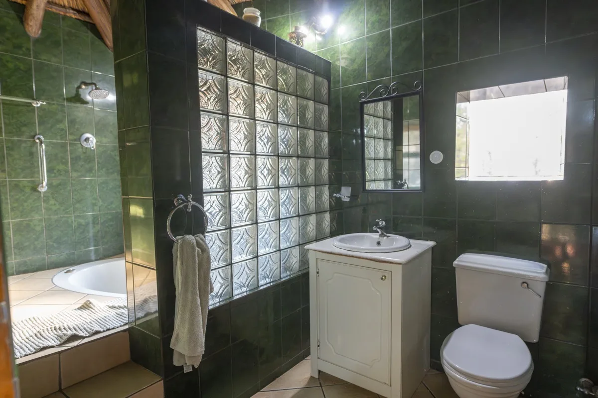En-suite bathroom with sunken bath